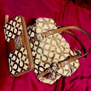 Coach bag/wallet, tan w/Brown Cs, Inside wallet is pink, inside bag is dark red